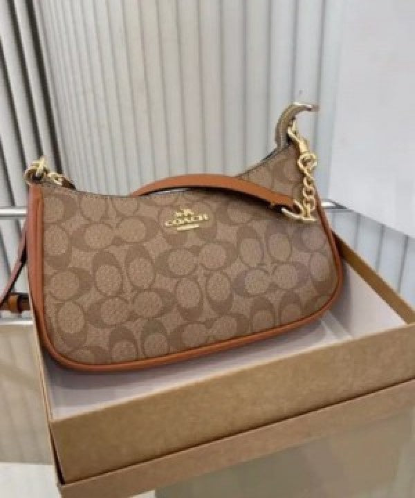 Coaach teri shoulder bag in signature canvas bag with box