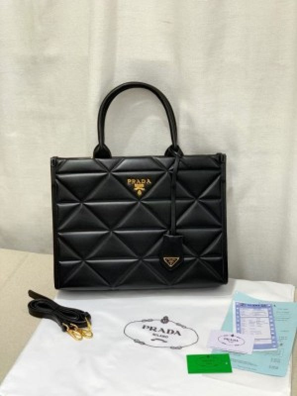 Prrada leather symbole tote bag with dust cover & dust bag