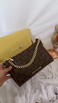 MIICHAEL KORRS SLING BAG WITH ORIGNAL BOX