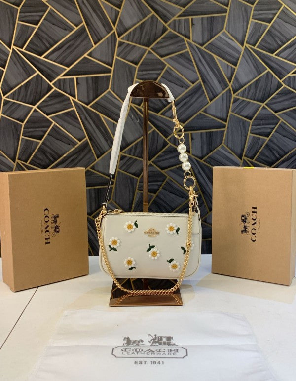 Coaach Nolita Classy Flower Patch Sling Bag With box