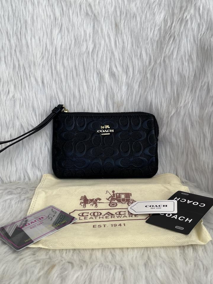 Coachh Emboss Wristlet With DustCover