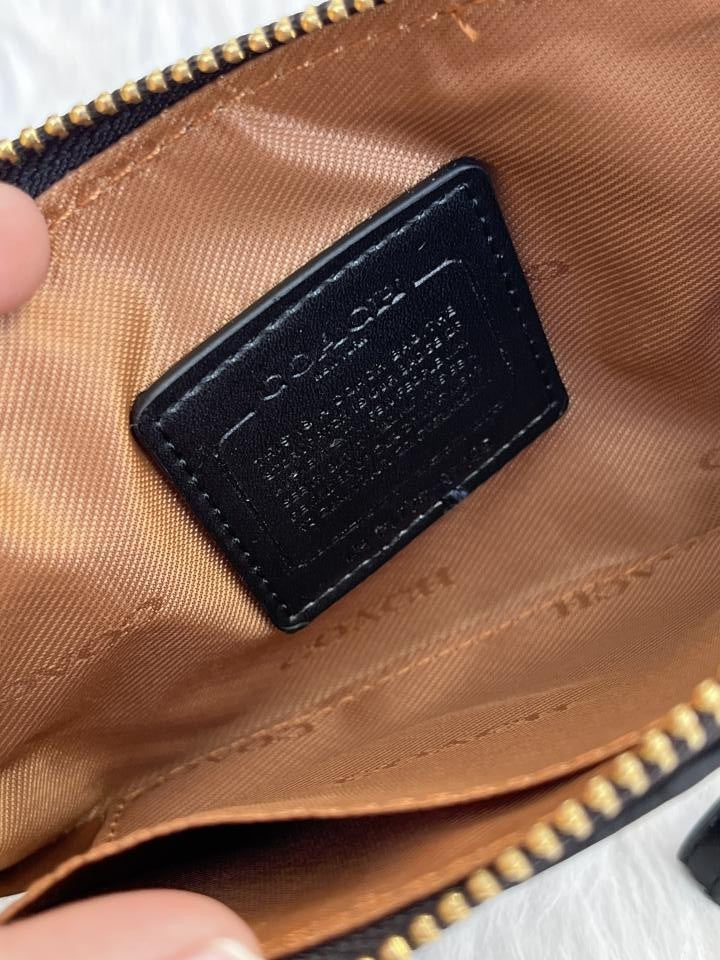 Coachh Emboss Wristlet With DustCover