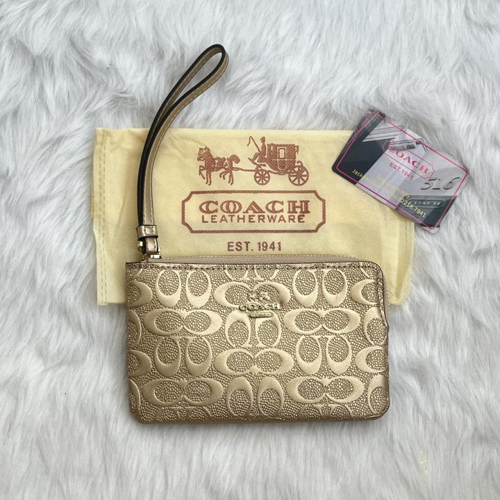 Coachh Emboss Wristlet With DustCover