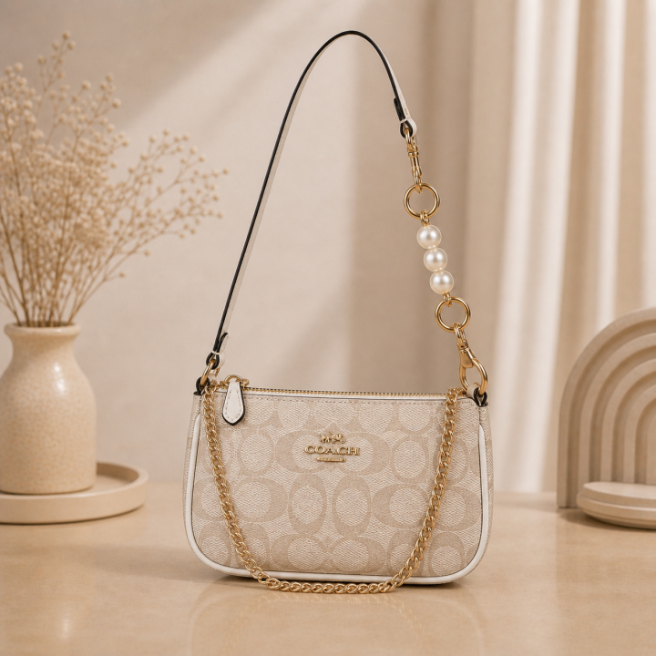 Coaach Nolita Classy Flower Patch Sling Bag With box