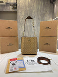 Coachh mollie signature bucket bag with extra long sling and carry bag