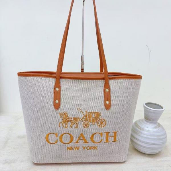 Coaach voyager jet set print tote bag with dust bag