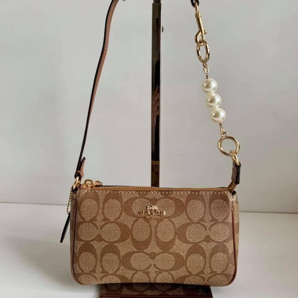 Coaach Nolita Classy Flower Patch Sling Bag With box